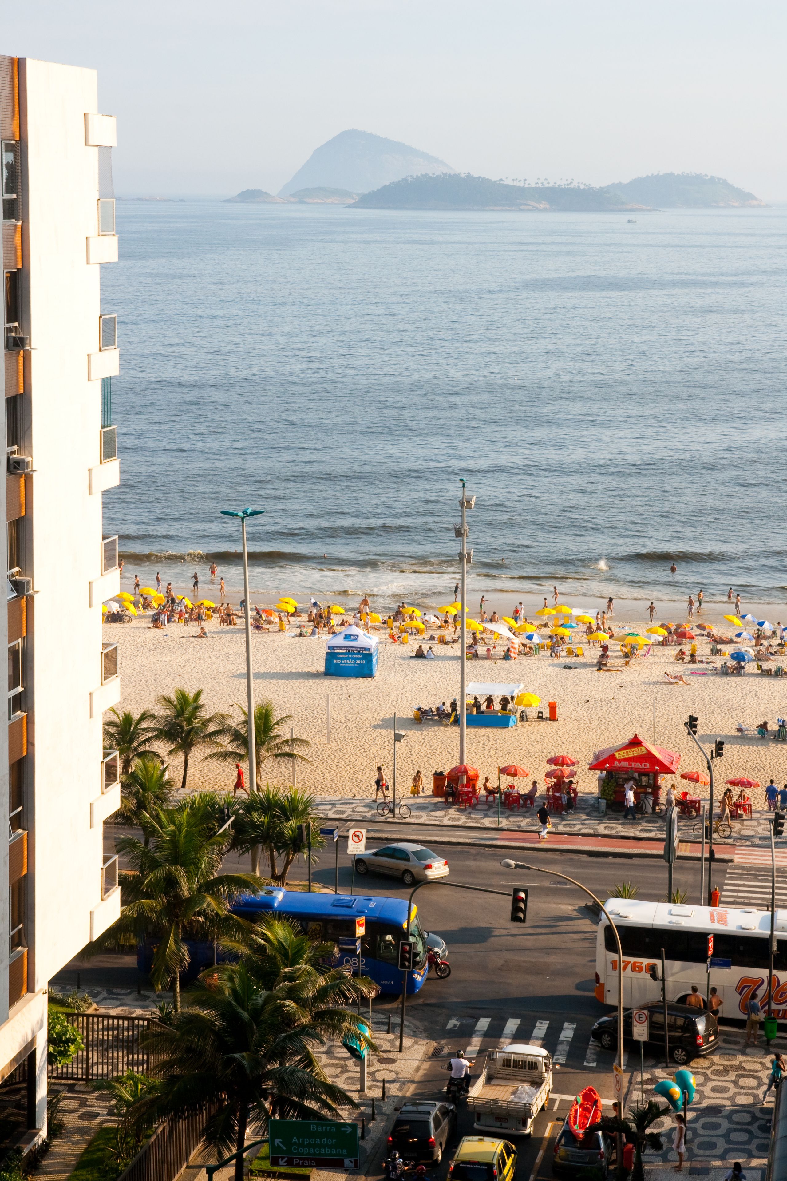 beach nearby, beach umbrellas, beach towels, beach volleyball