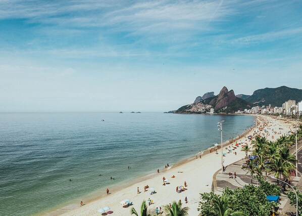 Beach nearby, beach umbrellas, beach towels, beach volleyball
