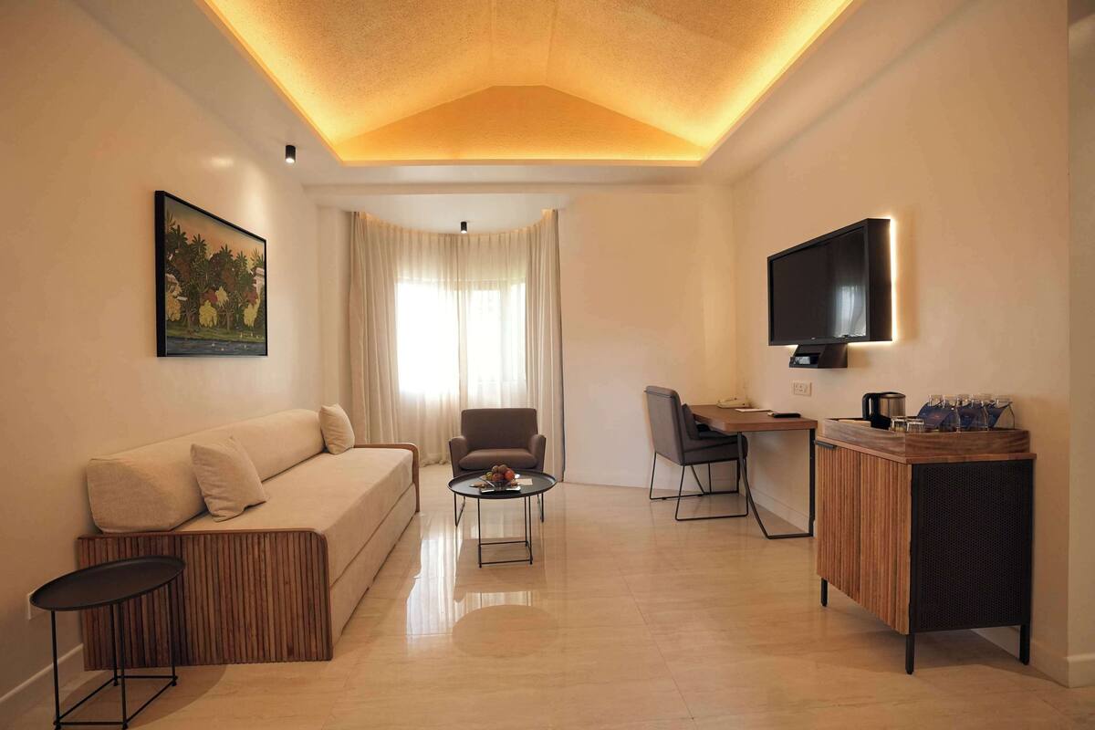 Premium Suite, 1 King Bed, Non Smoking (Separate Living Room;with Sofabed) | Living area | 43-inch TV with digital channels, table tennis, books