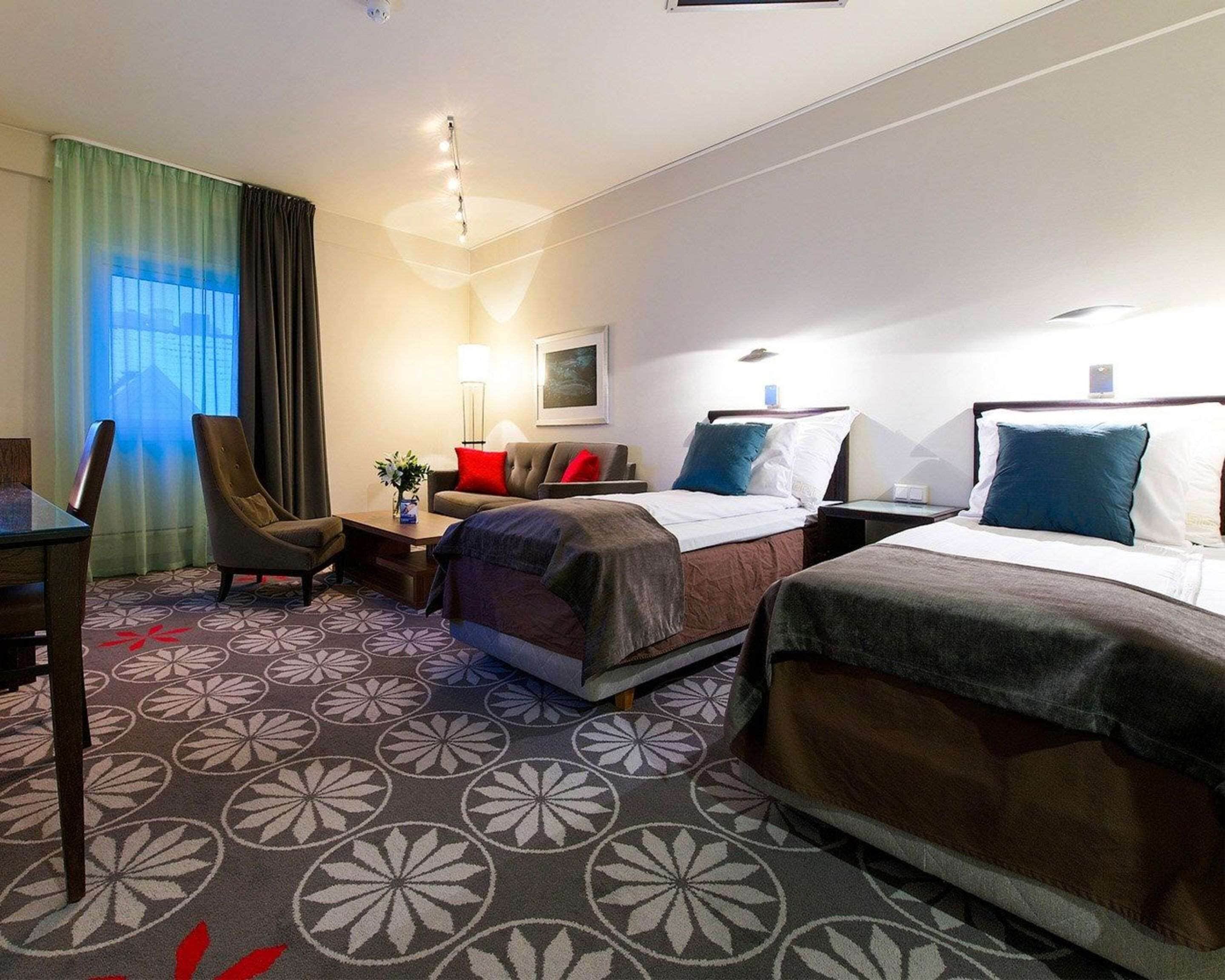 desk, laptop workspace, iron/ironing board, cots/infant beds