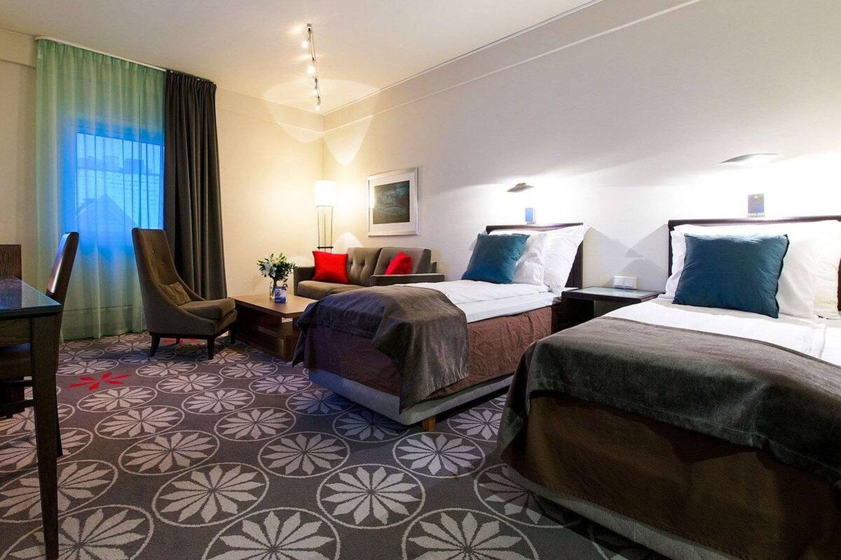 desk, laptop workspace, iron/ironing board, cots/infant beds