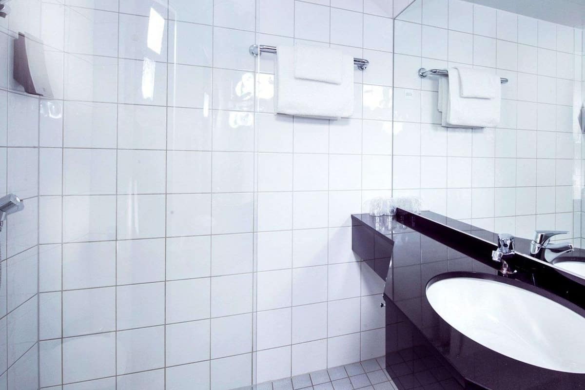 desk, laptop workspace, iron/ironing board, cots/infant beds