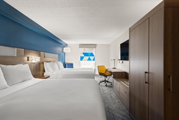 A hotel room with two beds, a desk, a chair, and a wardrobe. - Holiday Inn Express Hotel & Suites Danbury - I-84 by IHG (Danbury)