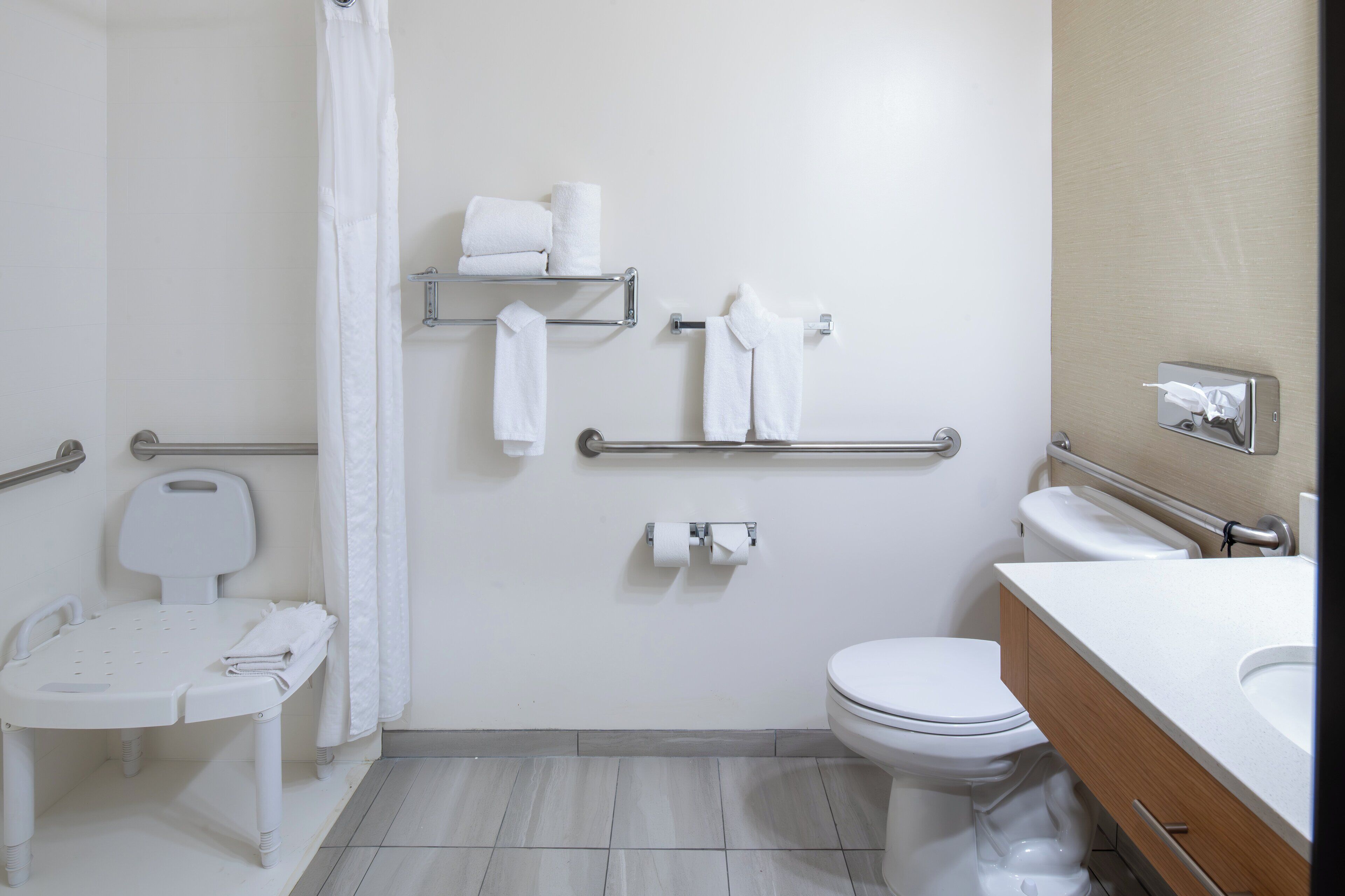 combined shower/bathtub, hair dryer, towels, soap