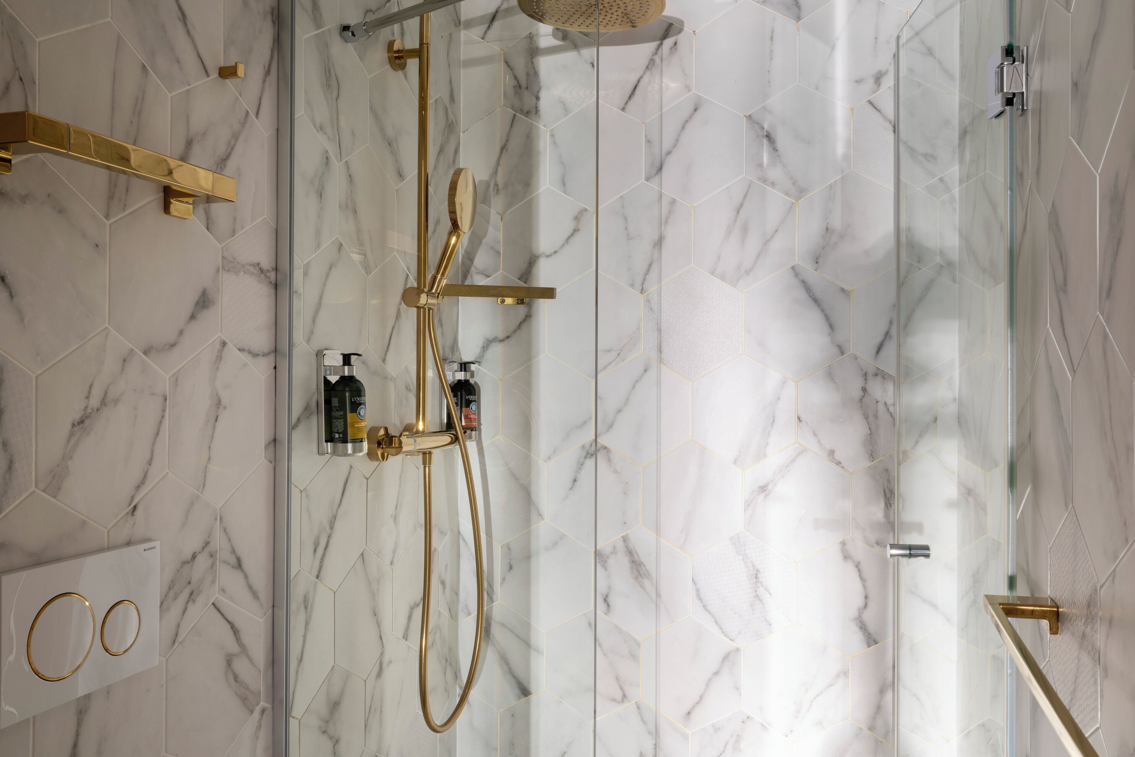 superior double room | bathroom | shower, designer toiletries, hair dryer, towels