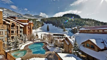 Outdoor pool, open 9:00 AM to 11:00 PM, pool loungers