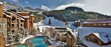 Outdoor pool, open 9:00 AM to 11:00 PM, pool loungers