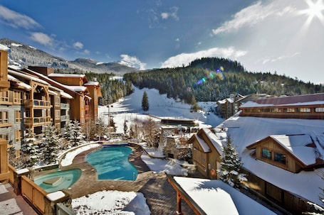 Outdoor pool, open 9:00 AM to 11:00 PM, sun loungers. Legends Whistler, by Lodging Ovations