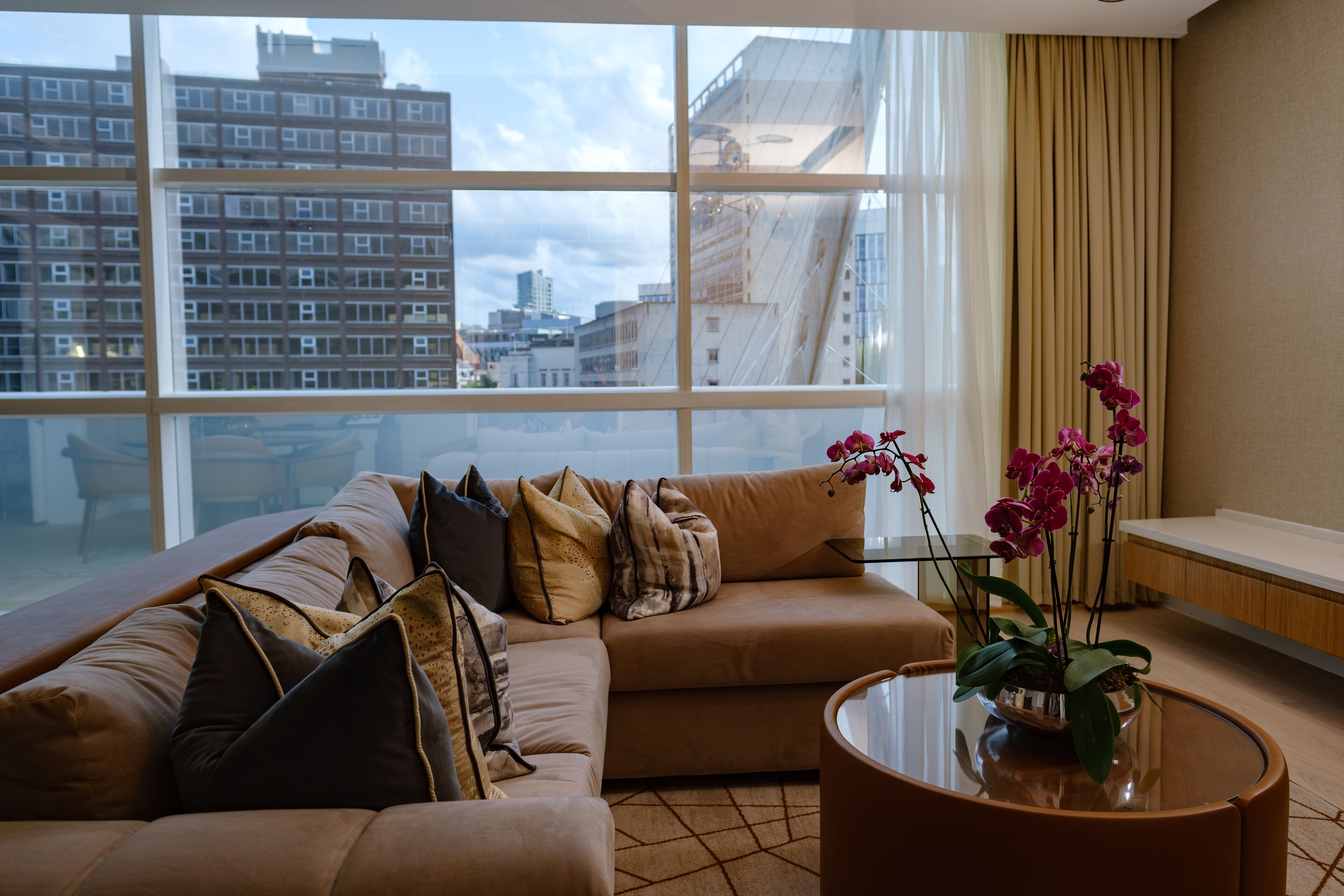 Suite, 1 King Bed (Riverside) | Living area | 32-inch plasma TV with satellite channels, TV