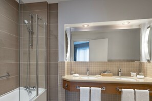 Suite, 1 Bedroom | Bathroom | Combined shower/tub, designer toiletries, hair dryer, towels