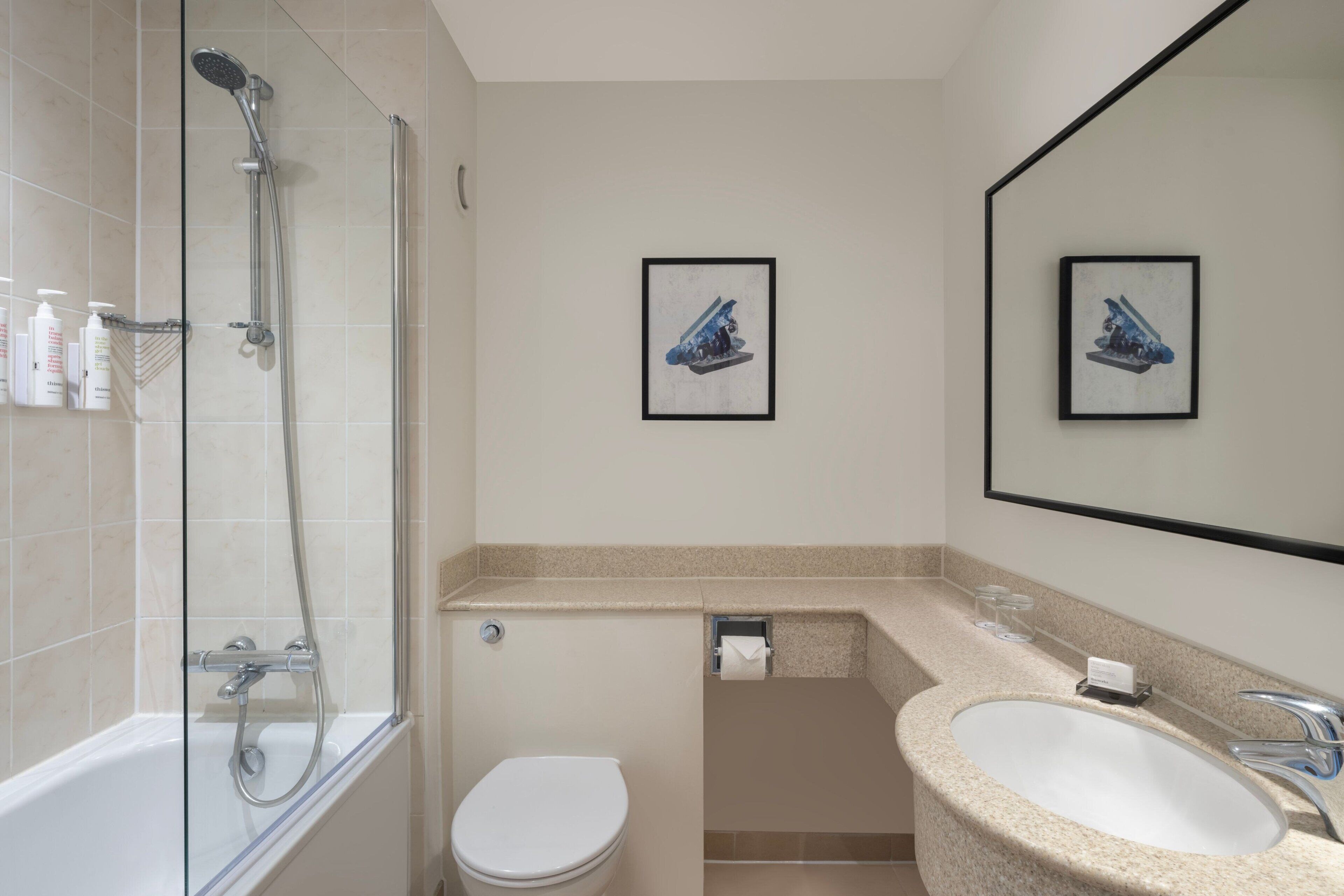 combined shower/bathtub, eco-friendly toiletries, hair dryer, towels