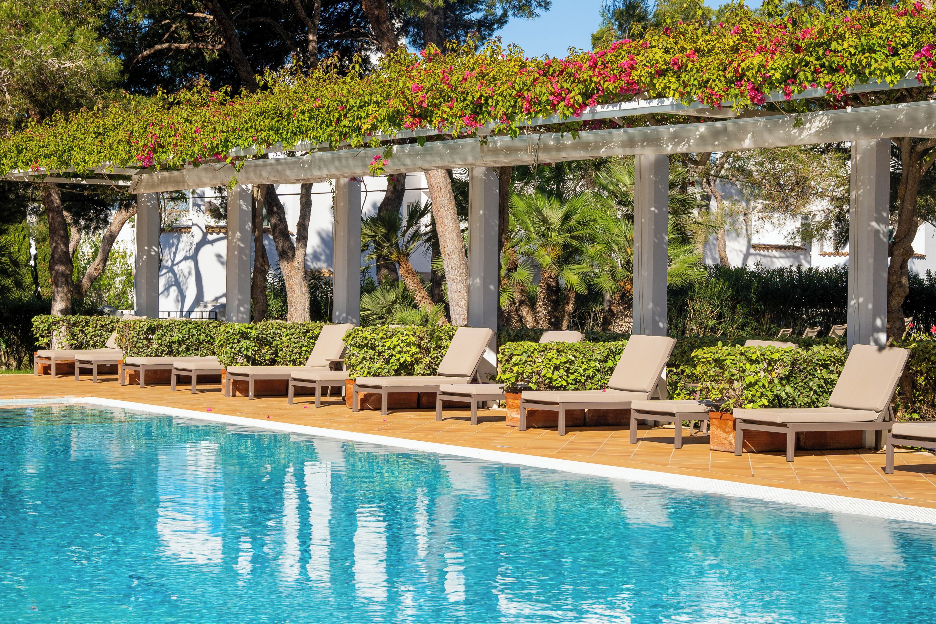 indoor pool, seasonal outdoor pool, pool umbrellas, pool loungers