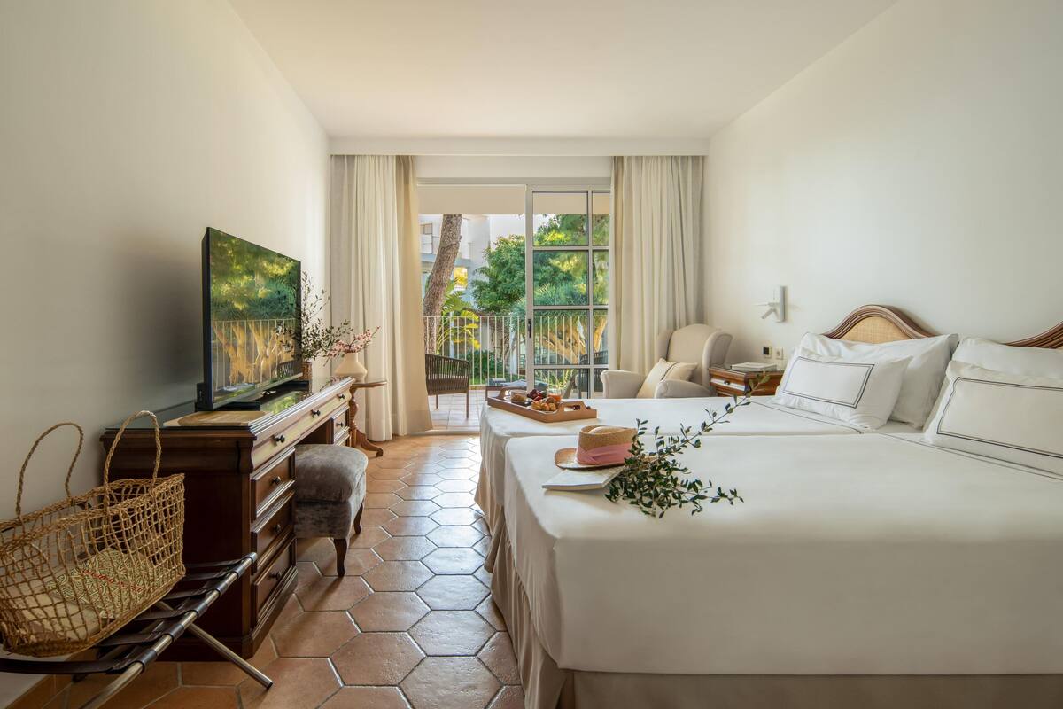 Minibar, in-room safe, blackout curtains, free cots/infant beds