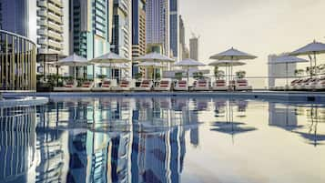 Outdoor pool, open 6:00 AM to 8:00 PM, pool umbrellas, pool loungers