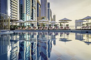 Outdoor pool, open 6:00 AM to 7:00 PM, pool umbrellas, pool loungers