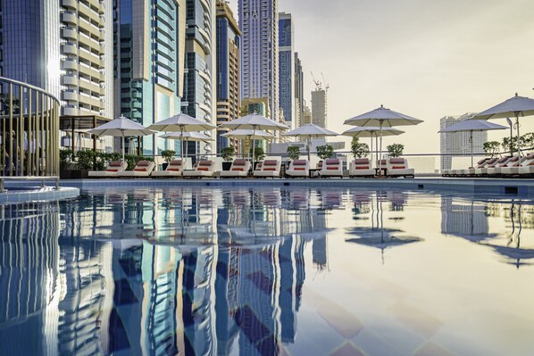 Outdoor pool, open 6:00 AM to 8:00 PM, pool umbrellas, sun loungers