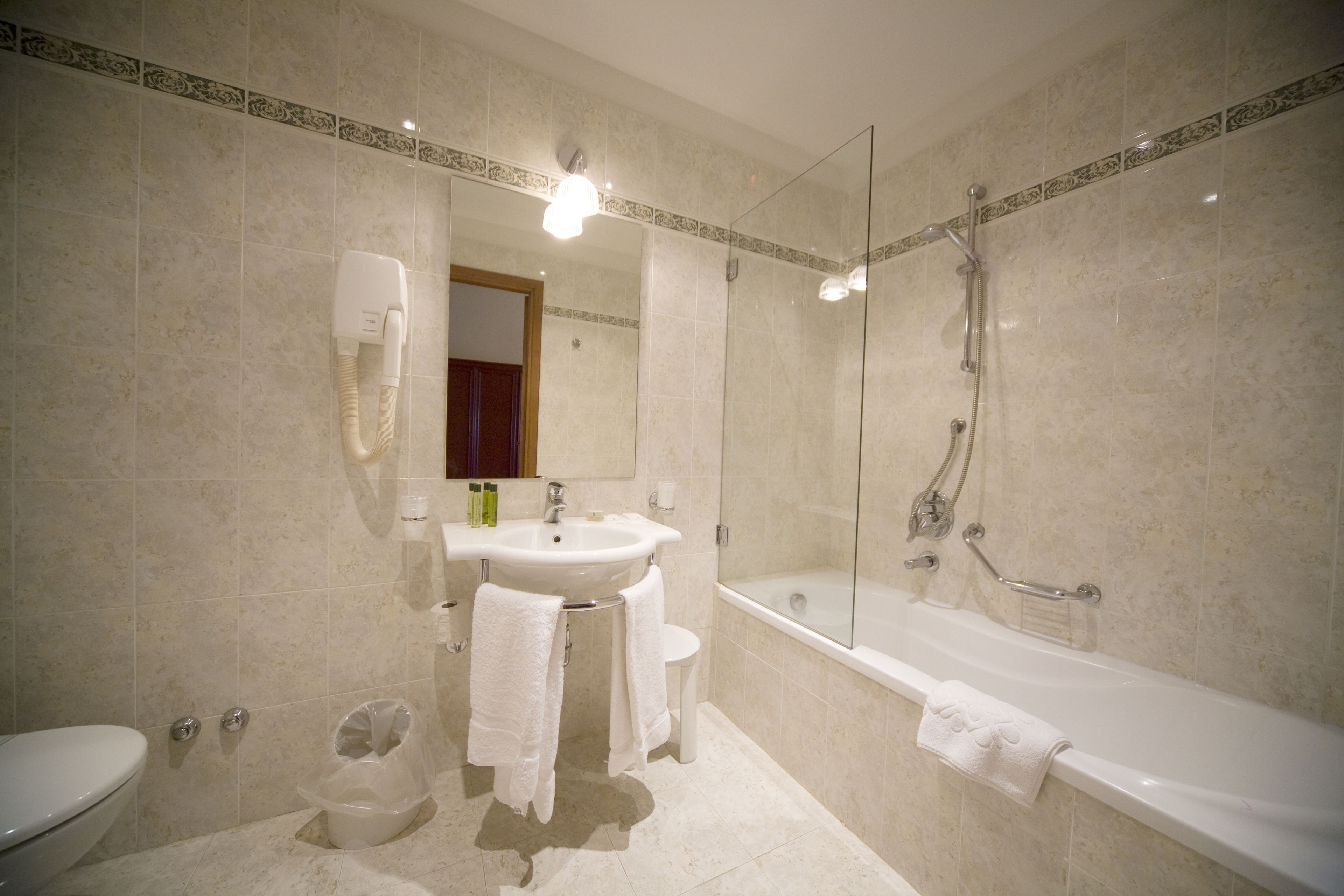 free toiletries, hair dryer, bidet, towels