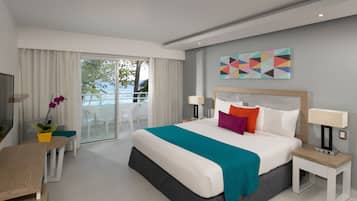 Deluxe Room, Ocean View | Minibar, in-room safe, desk, blackout drapes