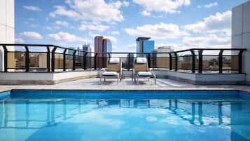 Outdoor pool, pool umbrellas, sun loungers