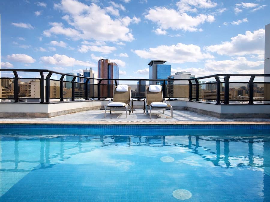 Outdoor pool, pool umbrellas, sun loungers