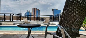 Outdoor pool, pool umbrellas, pool loungers