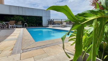 Outdoor pool, pool umbrellas, pool loungers