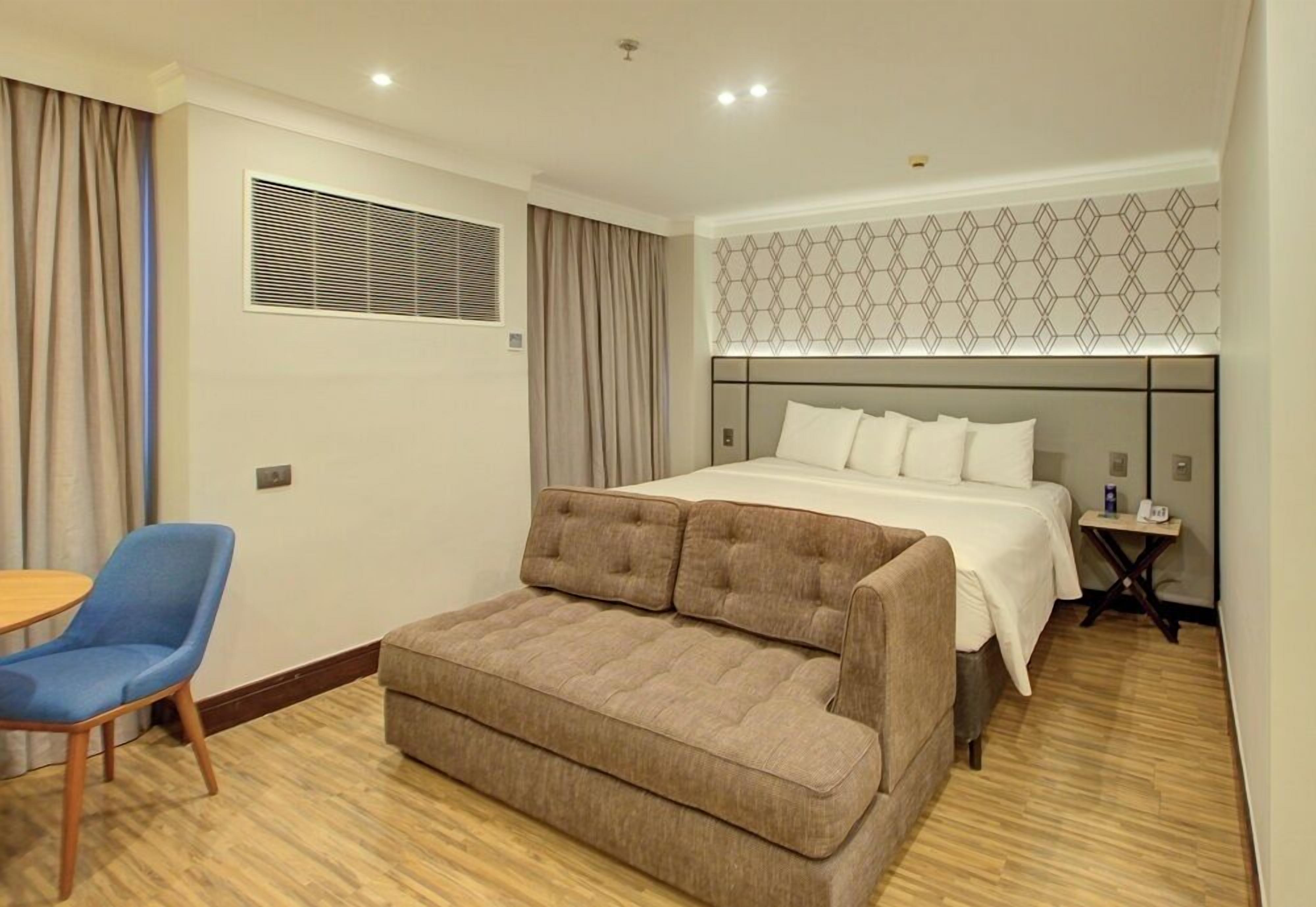 Luxury Room, 1 King Bed | Minibar, in-room safe, desk, laptop workspace