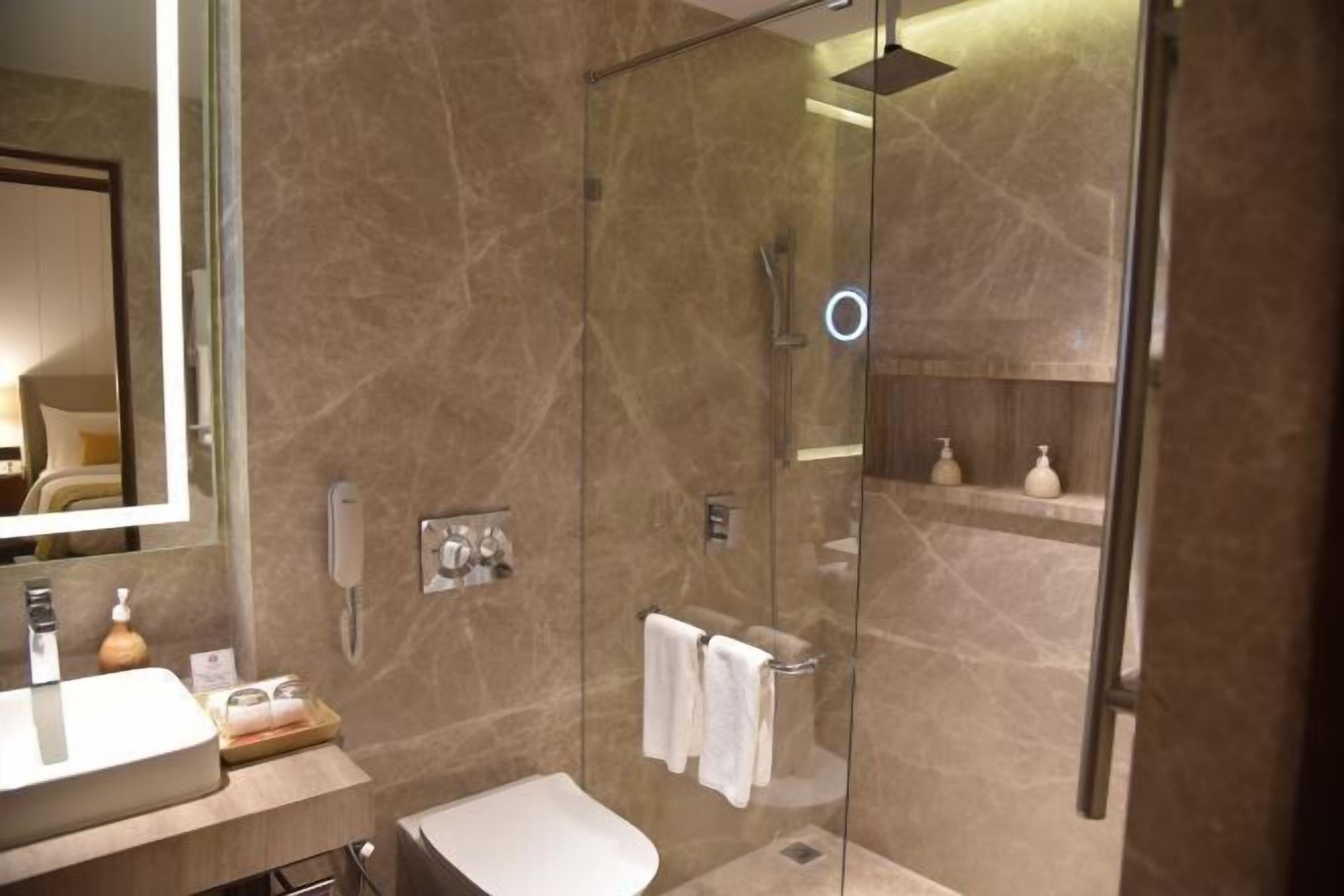 Bathroom | Shower, rainfall showerhead, designer toiletries, hair dryer