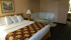 特级套房, 1 张特大床, 按摩浴缸 | 办公桌、熨斗/熨衣板、免费 WiFi、床单