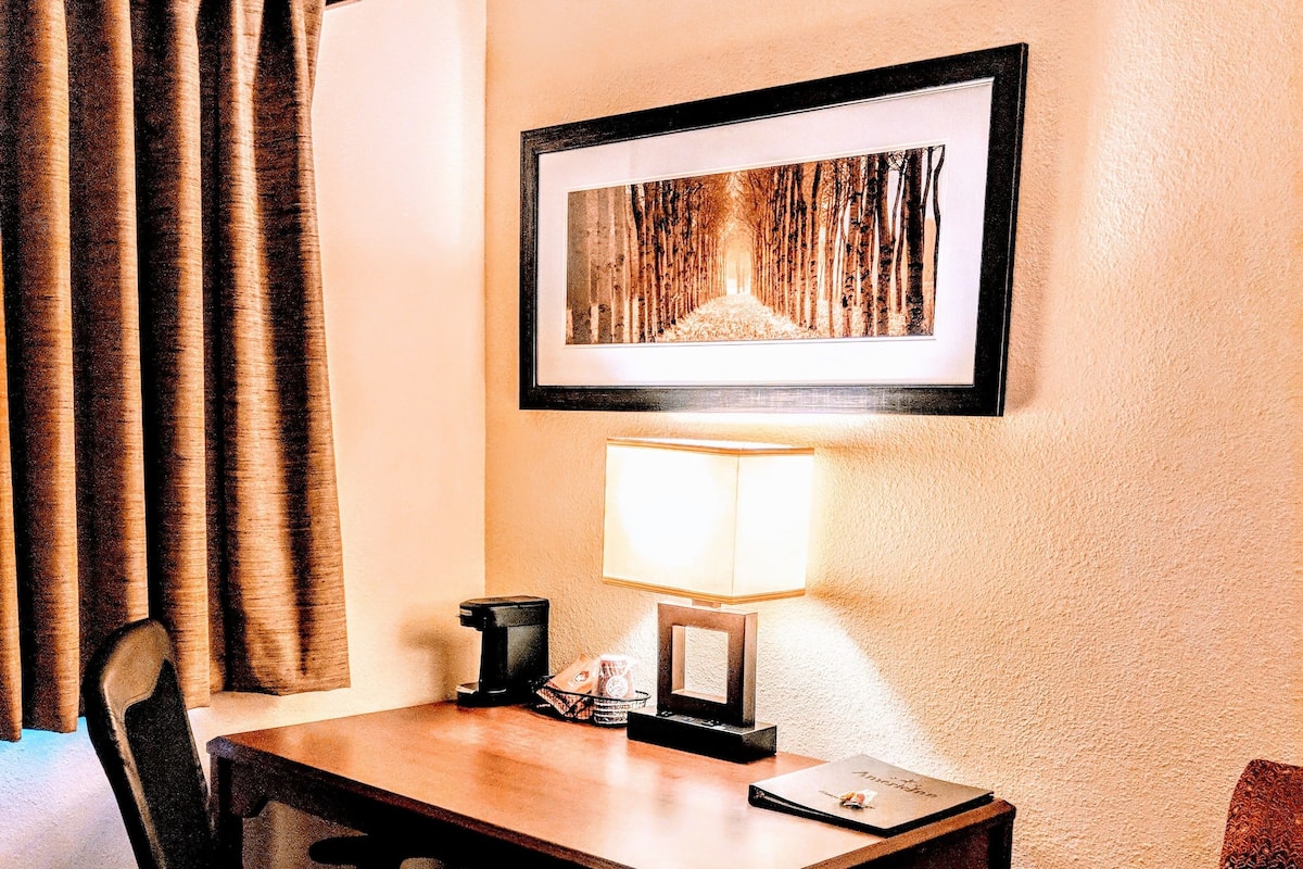 Individually furnished, desk, laptop workspace, blackout curtains