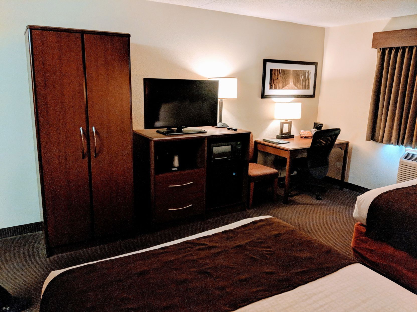 Individually furnished, desk, laptop workspace, blackout curtains