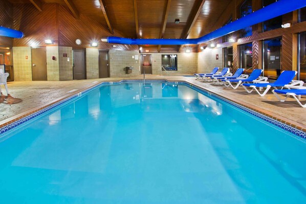 Indoor pool, open 7:00 AM to 10:00 PM, pool loungers