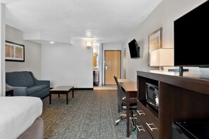 Suite, 1 King Bed, Non Smoking, Refrigerator & Microwave (with Sofabed) | Laptop workspace, iron/ironing board, free cribs/infant beds