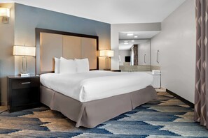 Suite, 1 King Bed, Non Smoking, Jetted Tub (with Sofabed) | Laptop workspace, iron/ironing board, free cribs/infant beds