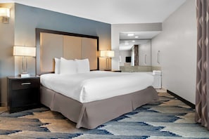 Suite, 1 King Bed, Non Smoking, Jetted Tub (with Sofabed) | Laptop workspace, iron/ironing board, free cribs/infant beds