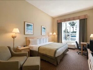 Habitación estándar, 1 cama King size | Escritorio, tabla de planchar con plancha, wifi gratis y ropa de cama