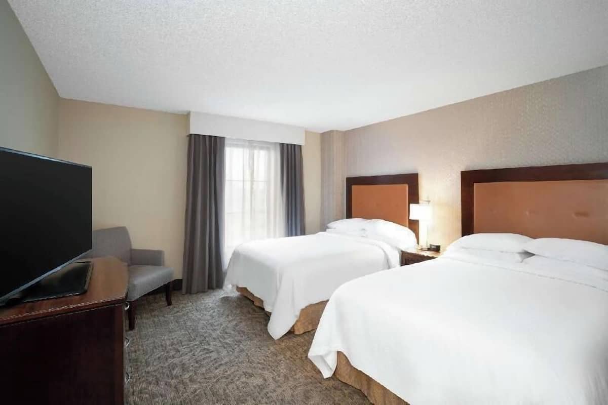 Premium bedding, pillow-top beds, in-room safe, desk