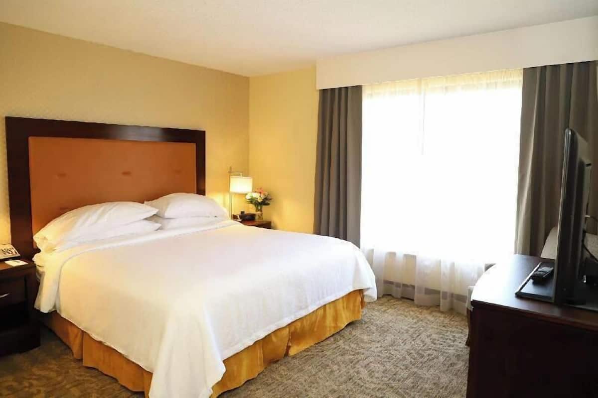 Premium bedding, pillow-top beds, in-room safe, desk