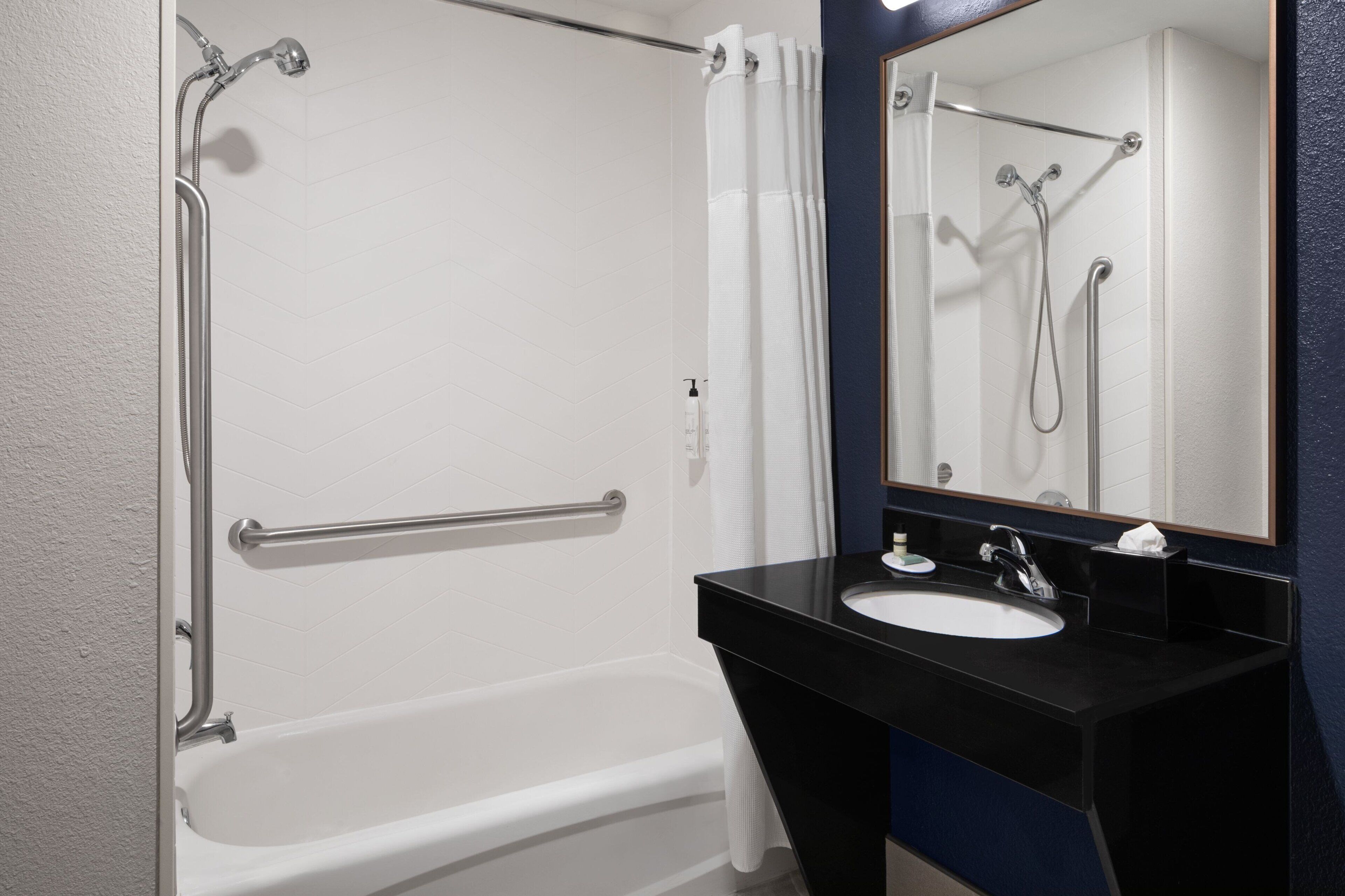 combined shower/bathtub, free toiletries, hair dryer, towels