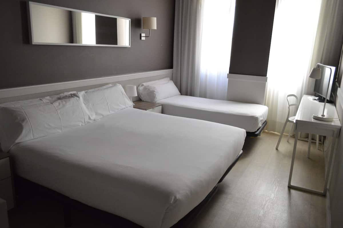 Standard Triple Room | Premium bedding, in-room safe, desk, blackout drapes