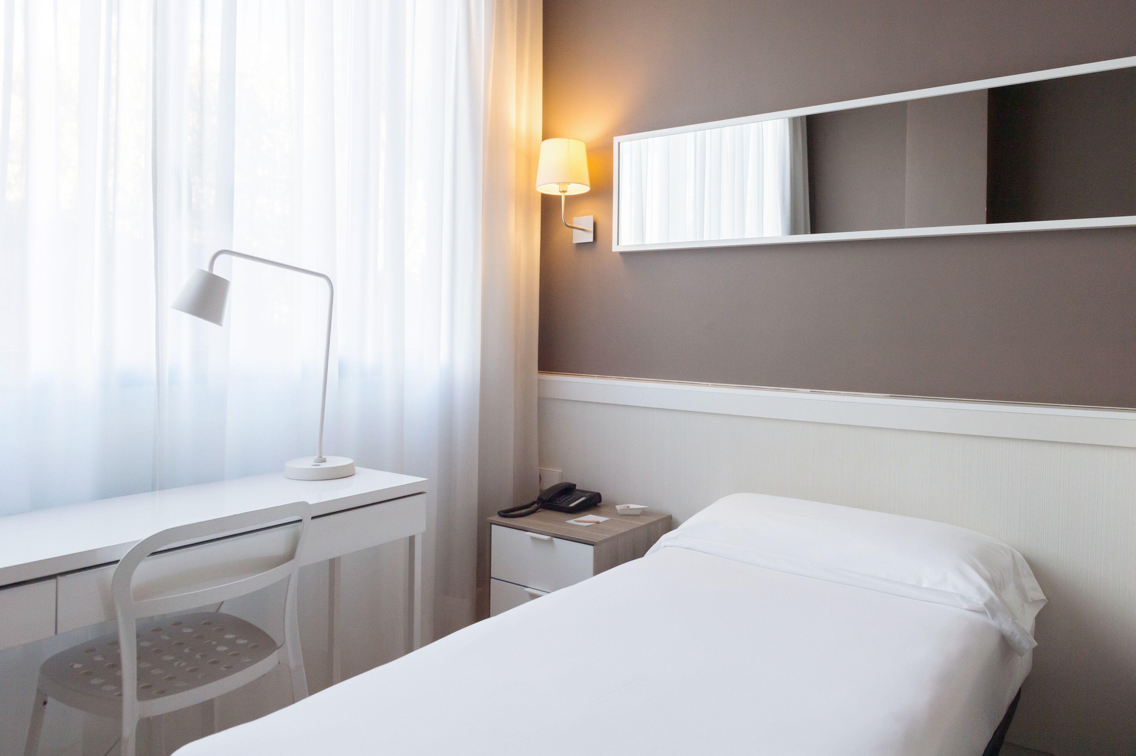 Roba de llit d'alta qualitat, minibar i caixa forta a l'habitació 