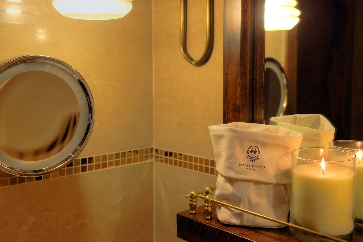 junior suite, sea view | bathroom | rainfall showerhead, designer toiletries, hair dryer, bathrobes