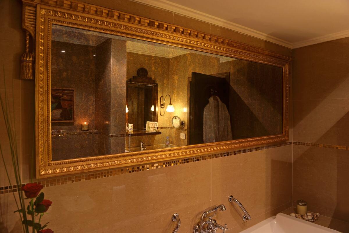 executive suite ( port view) | bathroom | rainfall showerhead, designer toiletries, hair dryer, bathrobes