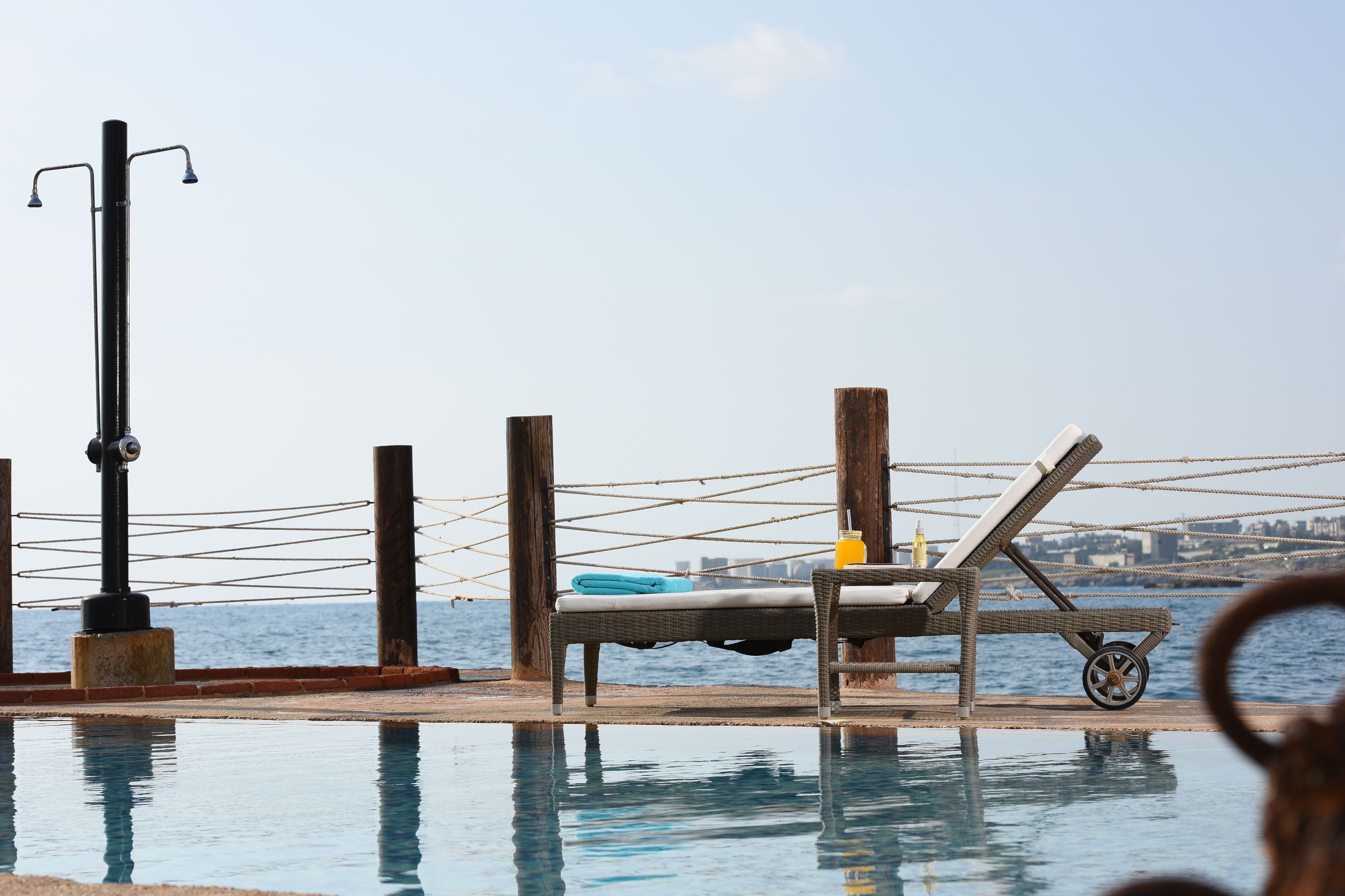 seasonal outdoor pool, pool umbrellas, pool loungers