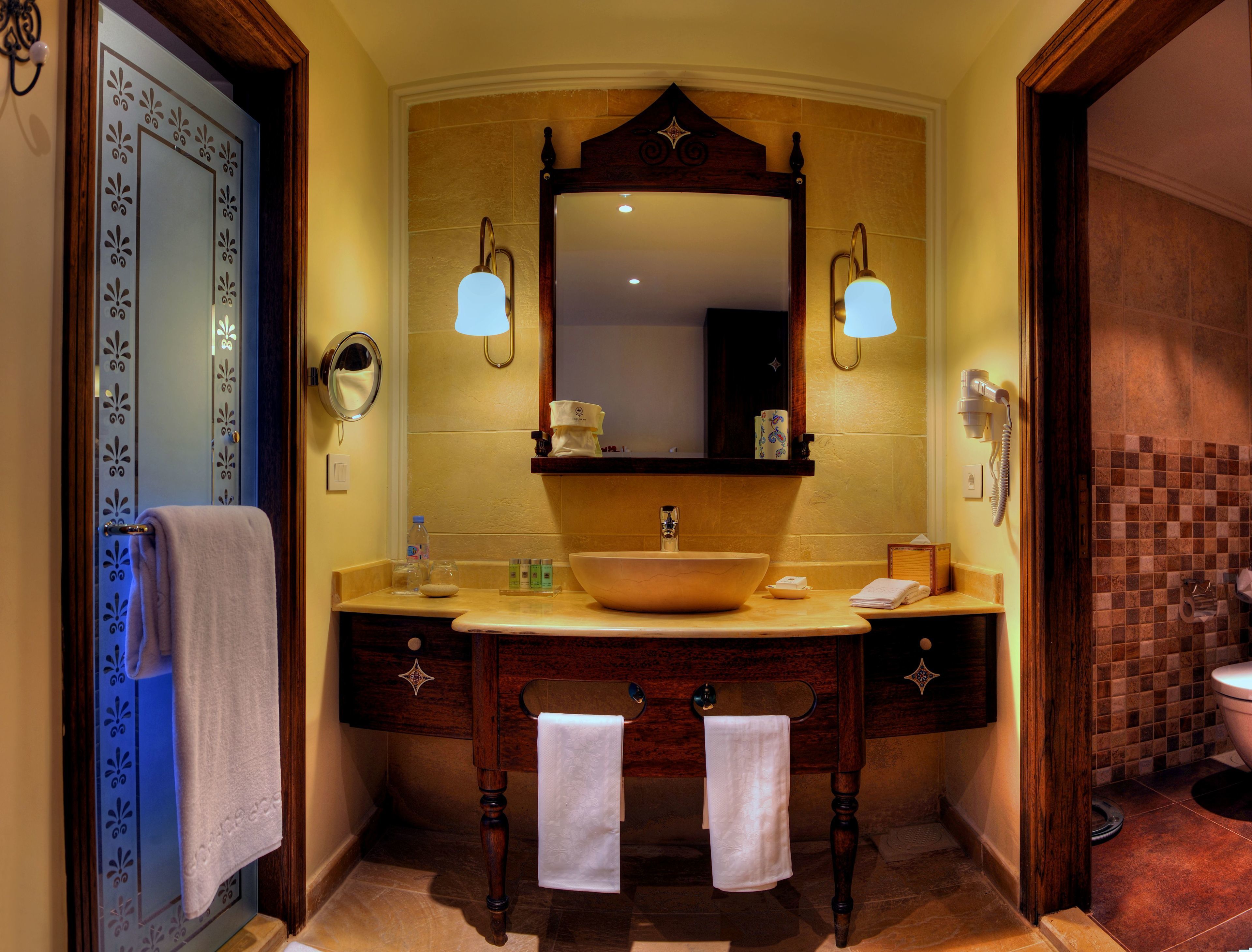 rainfall showerhead, designer toiletries, hair dryer, bathrobes