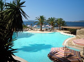 Indoor pool, seasonal outdoor pool, pool umbrellas, pool loungers