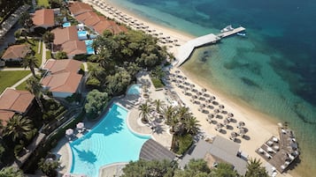 Indoor pool, seasonal outdoor pool, pool umbrellas, pool loungers