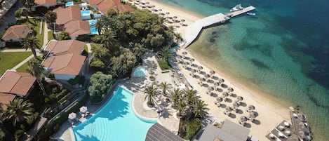 Indoor pool, seasonal outdoor pool, pool umbrellas, pool loungers