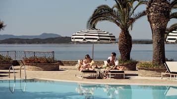 Indoor pool, seasonal outdoor pool, pool umbrellas, sun loungers