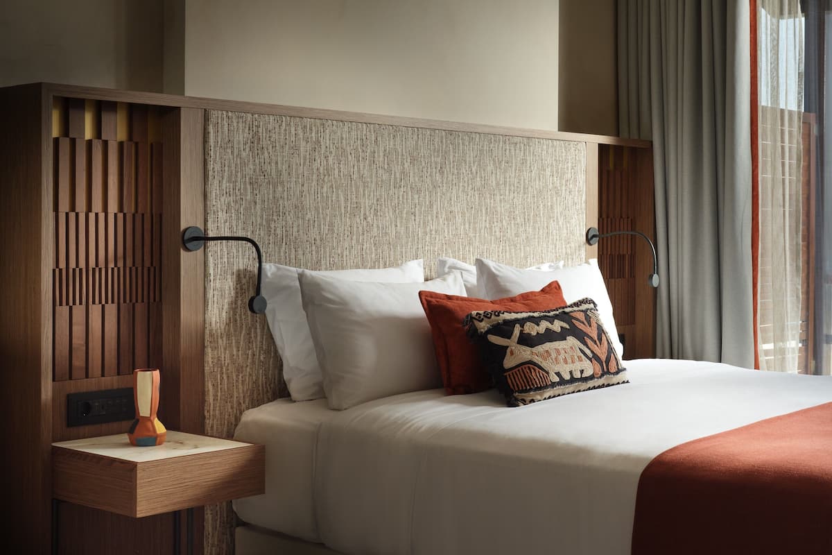 Chambre Double Deluxe, vue mer | Literie de qualité supérieure, minibar, coffres-forts dans les chambres
